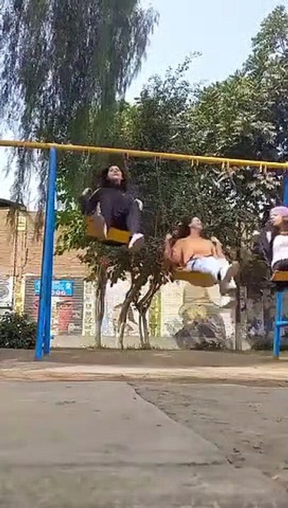 Friends Fall Off Swings Together