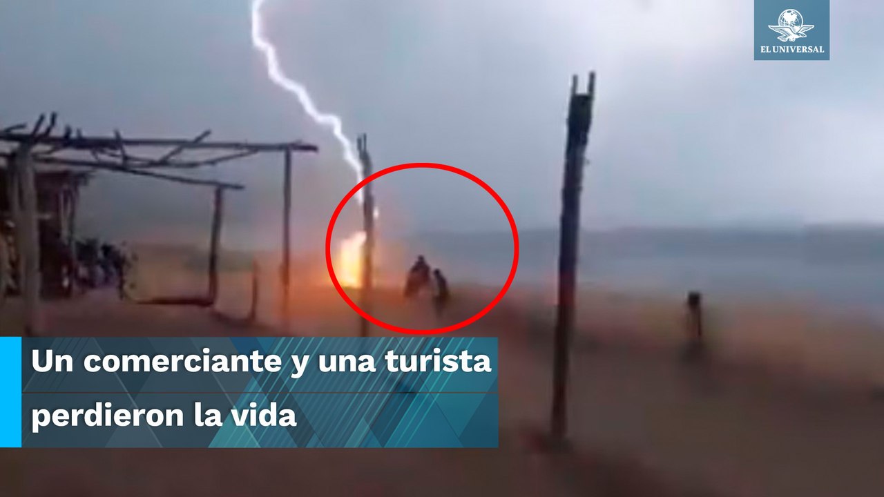 Rayo cae a dos personas en playa de Michoacán