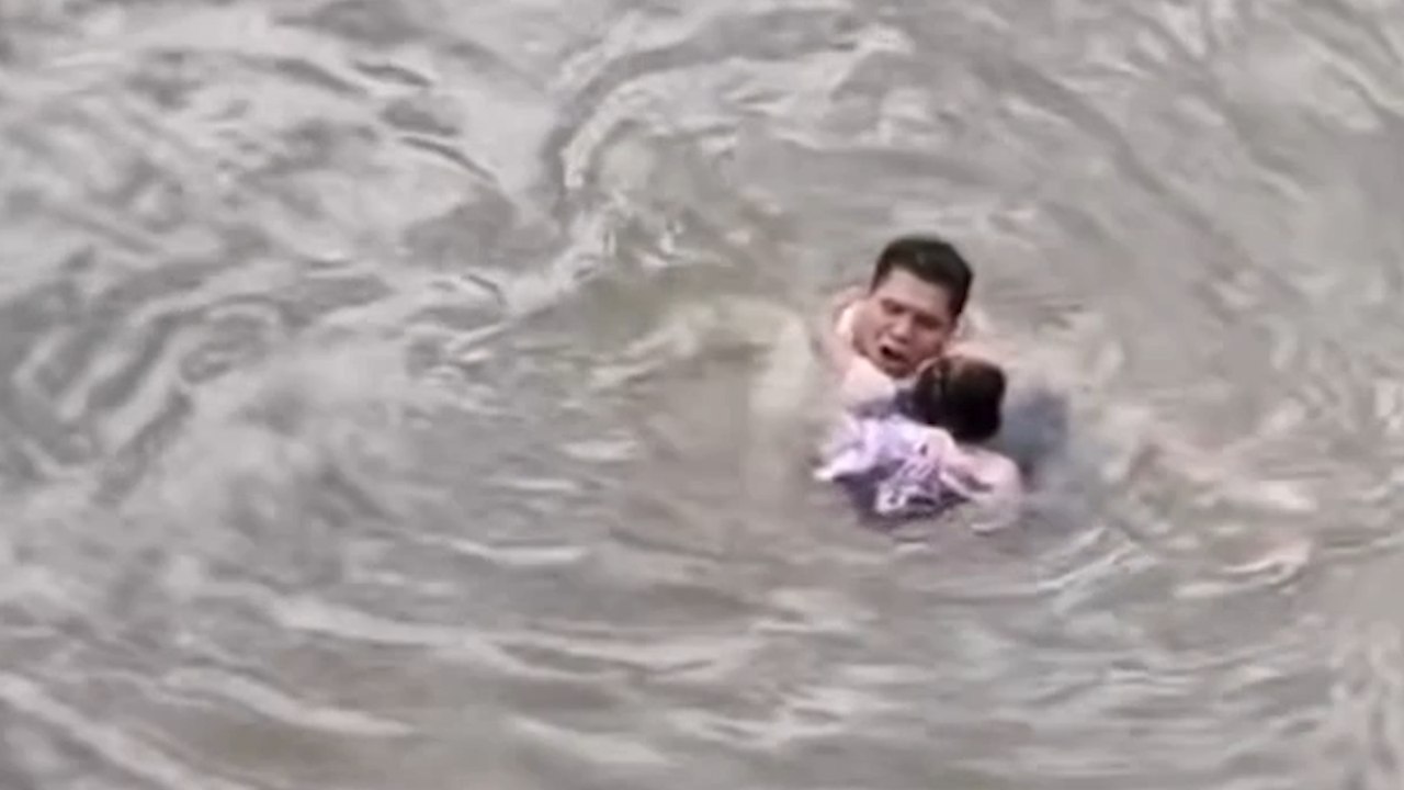 Hero Plunges Into River to Save Child Who Fell in and Got Swept Away ...