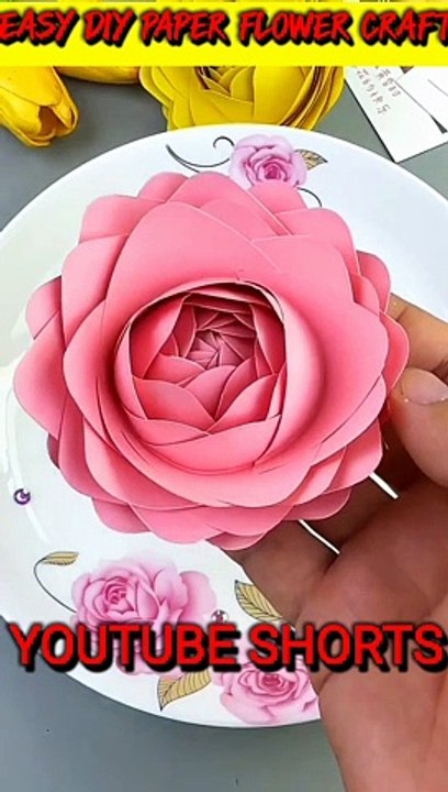 Title: " Create Stunning Paper Flower Crafts  #DIYCrafts"  Description: "Unleash your creativity and learn to make exquisite paper flowers with our easy DIY tutorials. Watch now to transform your space with these affordable and beautiful crafts! ✂️