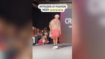 Intruder struts down New York Fashion Week catwalk in shower cap and bin bag