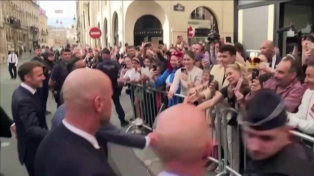 King Charles and President Macron greet well wishers in Paris