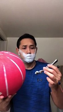 Man Shaves While Balancing Basketball on Razor