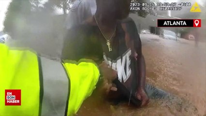 ABD'de sel felaketi: Suya gömülen sürücüye camı kırarak müdahale ettiler