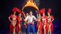 Circus Performer Earns Guinness World Record for Jumping Through Flaming Hoops While Tightrope Walking Without a Net