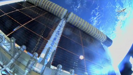 Footage From Helmet Cam Of Roll-Out Solar Array Unfurl During Spacewalk
