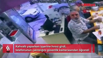 Kahvaltı yaparken iş yerine hırsız girdi, telefonunun çalındığını güvenlik kamerasından