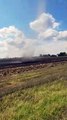 Dust Devil Moves Through Harvested Corn Field