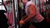 Cable triceps extensions with a modified Larry Scott's triceps bar