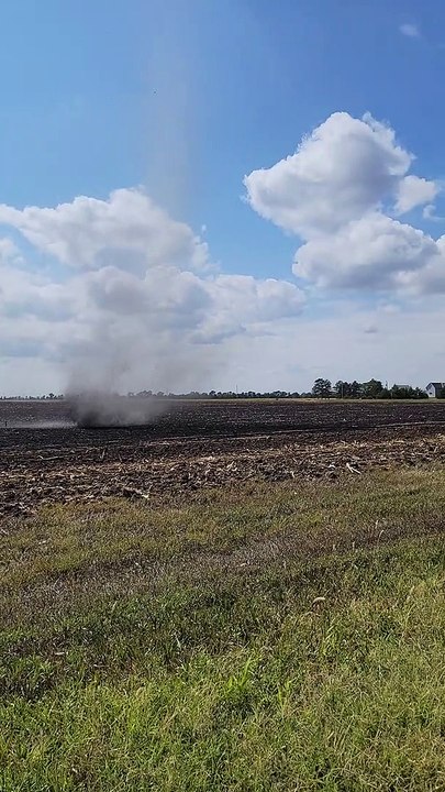 Dust Devil Moves Through Harvested Corn Field
