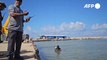 Porto de Derna troca barcos por escombros e corpos