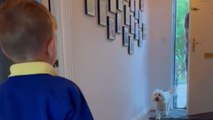 Son surprises daddy by wearing the school uniform for his first day of school