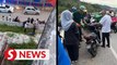 Motorcyclist survives 20m plunge from flyover