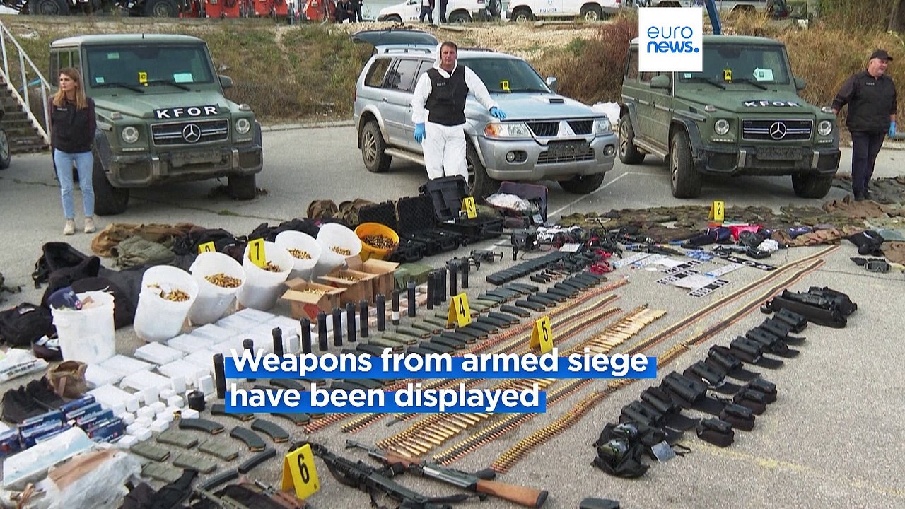 Kosovo mourns a slain police officer, some Serb gunmen remain at large after a siege at a monastery