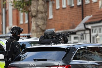 Armed police storm house to end 27 hour siege after man barricaded himself inside