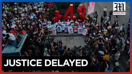 Families of 43 missing Mexican students march for answers after 9 years
