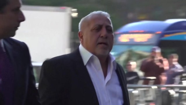 Senator Robert Menendez arrives at court to face corruption charges