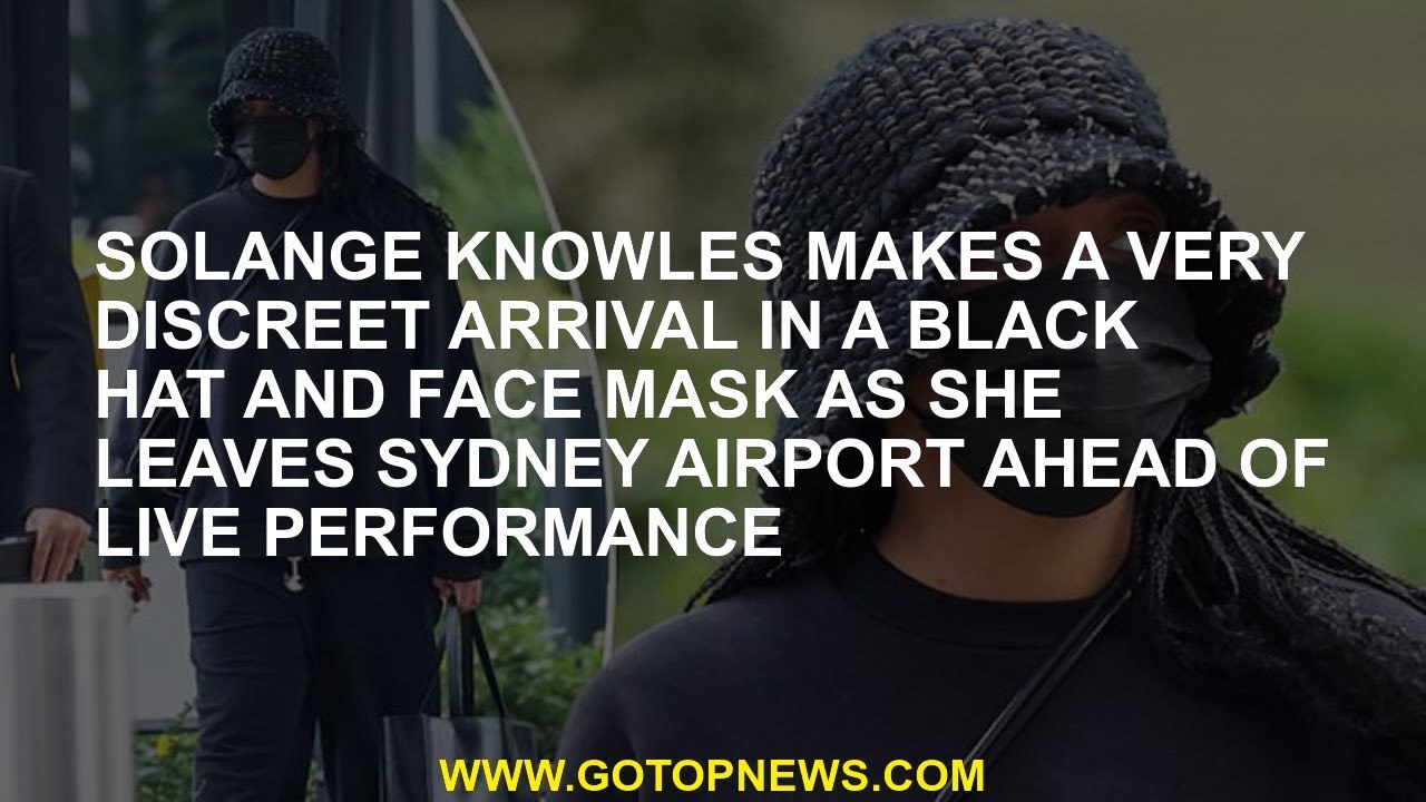 Solange Knowles makes a very discreet arrival in a black hat and face mask as she leaves Sydney Airp