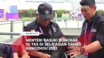 Potret Menteri Basuki Bongkar Isi Tas di Sela ASIAN Games Hangzhou 2022