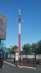 Riders Stuck In The Sky At Amusement Park
