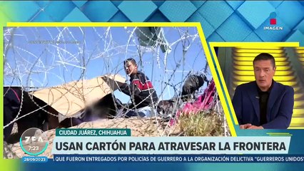 Mujer con su hija en brazos cruzan alambre de púas para llegar a EU