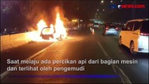 Ada Percikan Api, Mobil Sedan Hangus Terbakar di Tol JORR