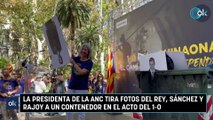 La presidenta de la ANC tirá fotos del Rey, Sánchez y Rajoy a un contenedor en el acto del 1-O