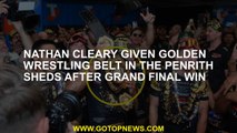Nathan Cleary given golden wrestling belt in the Penrith sheds after grand final win