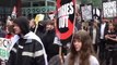 Protesters chant as they march through Manchester as Conservative Party annual conference begins