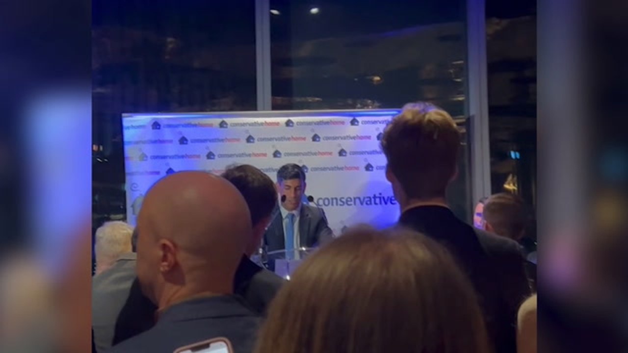 Rishi Sunak delivers a speech at an in Manchester