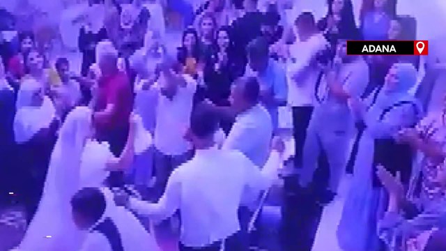 Damat, para takılı gelinliği çekiştiren çocuğu fırlatıp yere attı