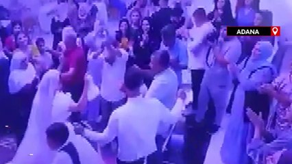 Damat, para takılı gelinliği çekiştiren çocuğu fırlatıp yere attı