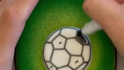 Baker makes exceptional-looking soccer-themed cookies for the soccer fanatics