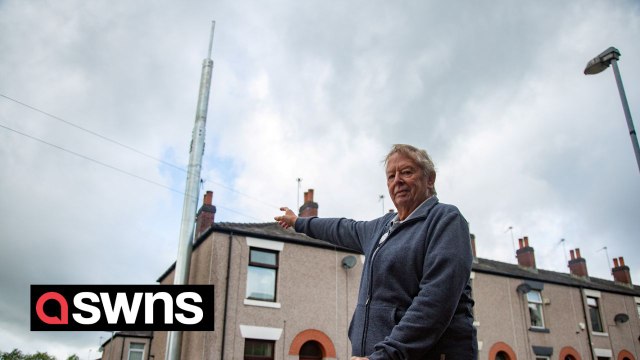 Residents fear their homes may plunge in value after an “eyesore” mast erected