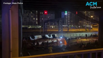 Horror holiday: 21 dead as tourist bus plunges off bridge