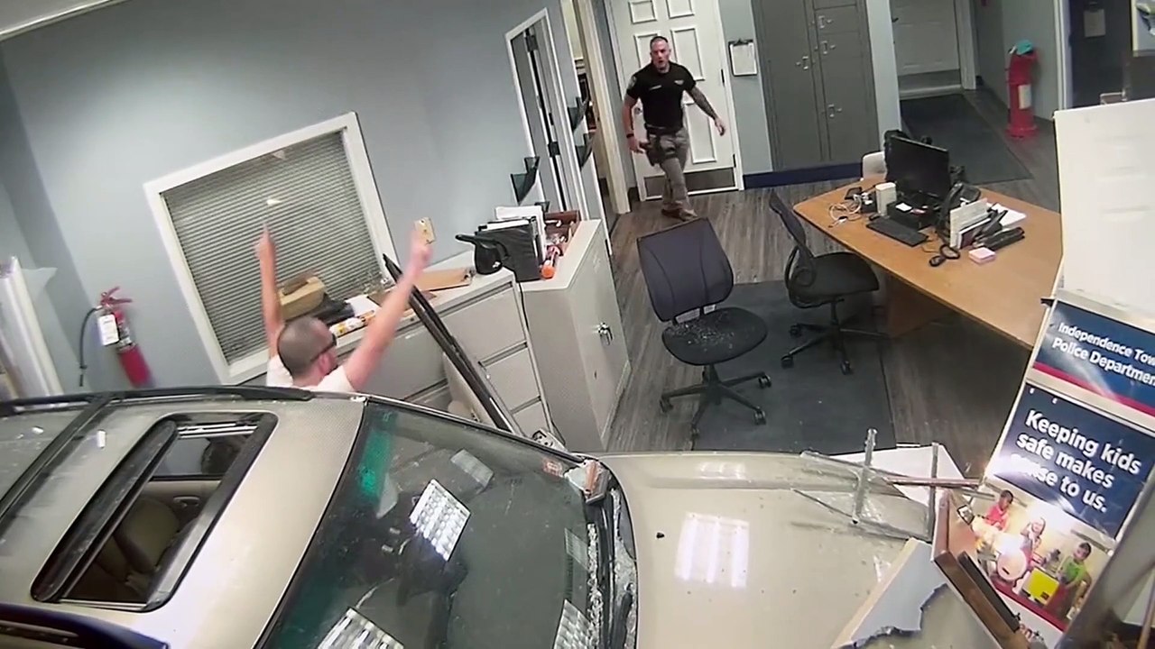 VIDEO: Man Crashes Car Into US Police Station While Playing Guns N' Roses, Faces Multiple Charges