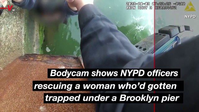 NYPD Officers rescue woman stuck below a Brooklyn Pier