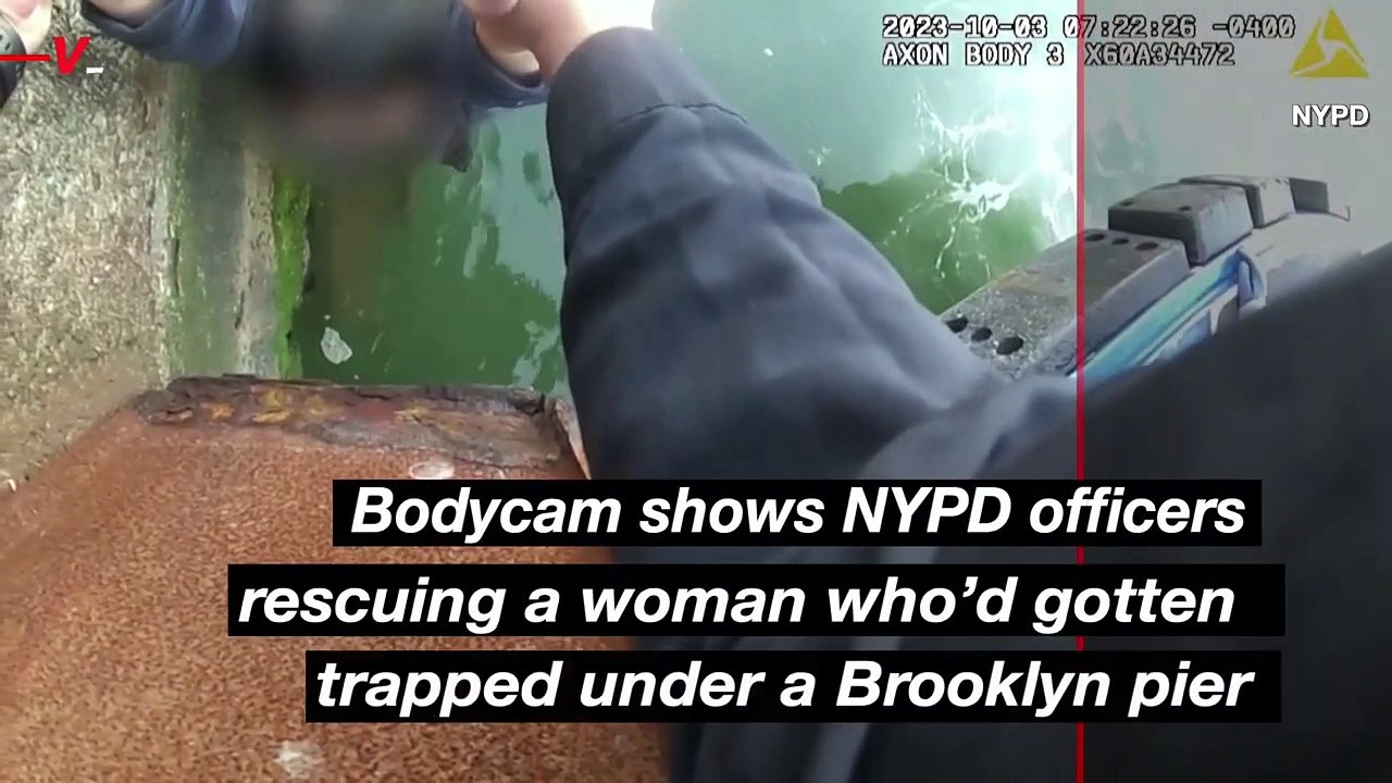 NYPD Officers rescue woman stuck below a Brooklyn Pier