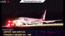 FedEx plane skids off the end of the runway Tennessee airport and hurtles