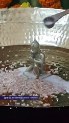 Abhishek being performed on Shree Hanuman ji during Pancha Kumbhabhishek _ Hanuman Purnima Utsav
