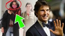 Katie Holmes 'stopped' as arrival of Tom Cruise at airport come pick her and Suri to enjoy Christmas