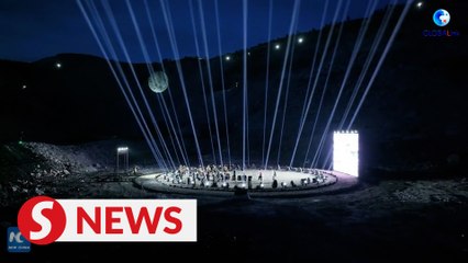 Changing from mine crater to earth art