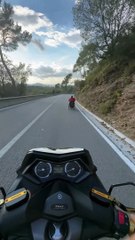 Motorcycle Follows Wheelchair Down Hill