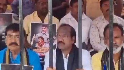 ఏలూరు జిల్లా: టీడీపీ నేతల చేతులకు సంకెళ్లు