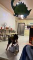Daughter Uses Stool to Reach Her Balloon