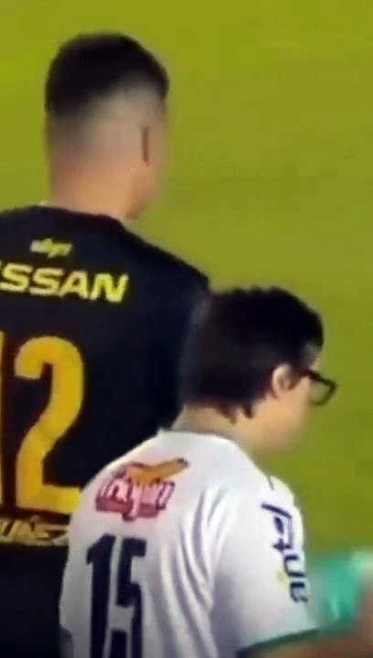 Young man with Down syndrome enters the soccer game to score a goal
