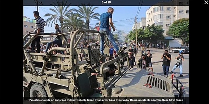 Footage appears to show hostages being taken by Hamas militants