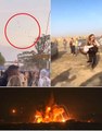 Stampede of terror: Terrifying moment hundreds of Israeli festivalgoers flee for their lives through the desert as Hamas paragliders storm religious celebration