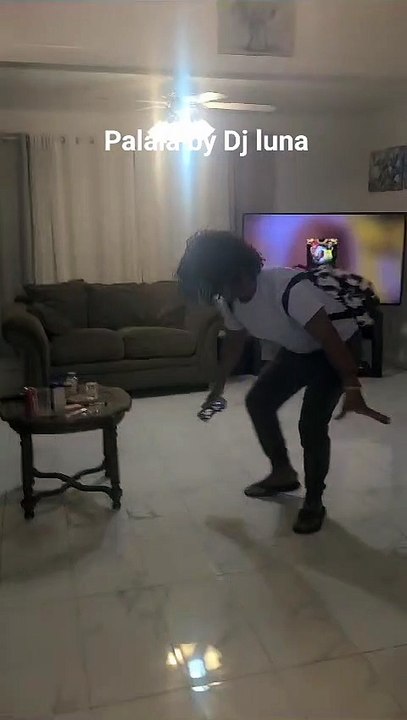 Dancing to the instrumental.