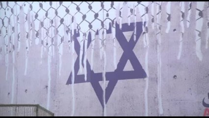 La bandiera israeliana si dissolve: slogan pro Hamas a Teheran